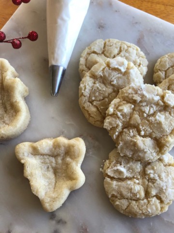 Christmas vanilla sugar cookies in a variety of regular and Christmas shapes