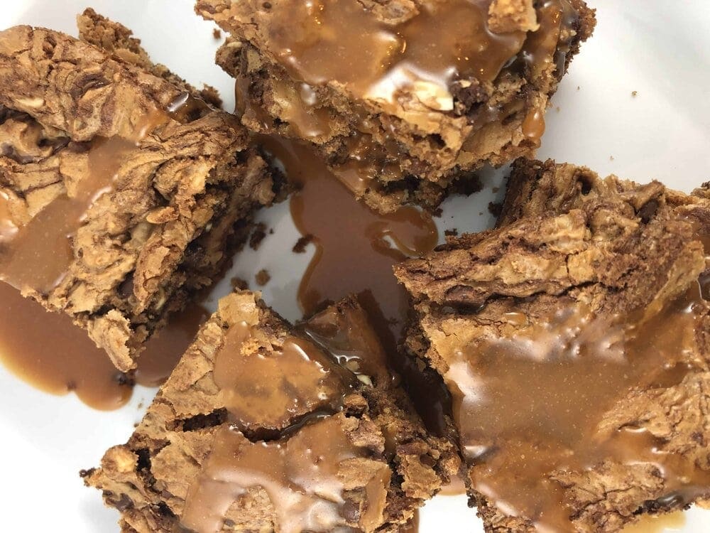 4 chocolate chip blondies with a drizzle of sea salt caramel sauce.