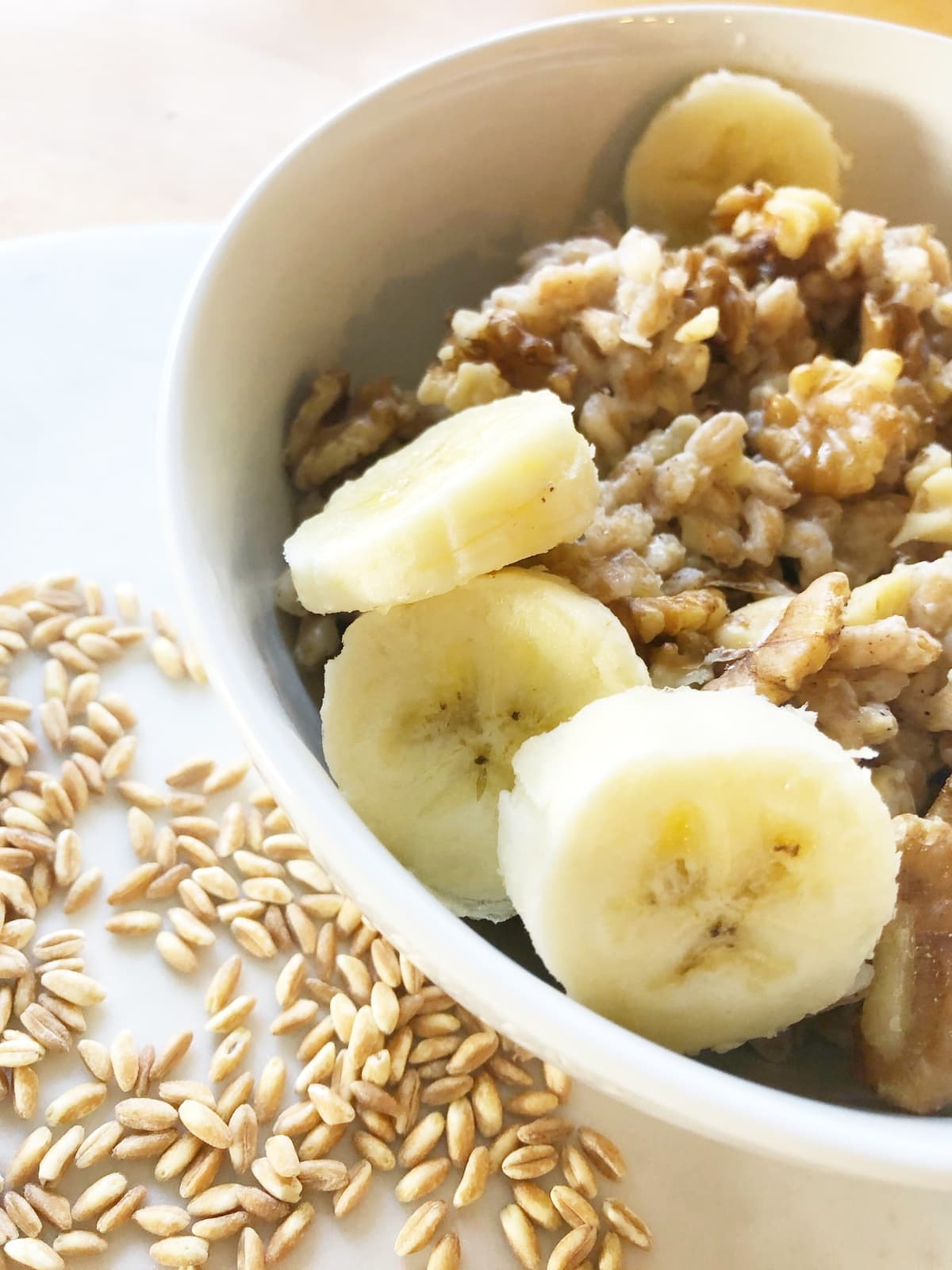 A banana nut farro breakfast bowl with bananas